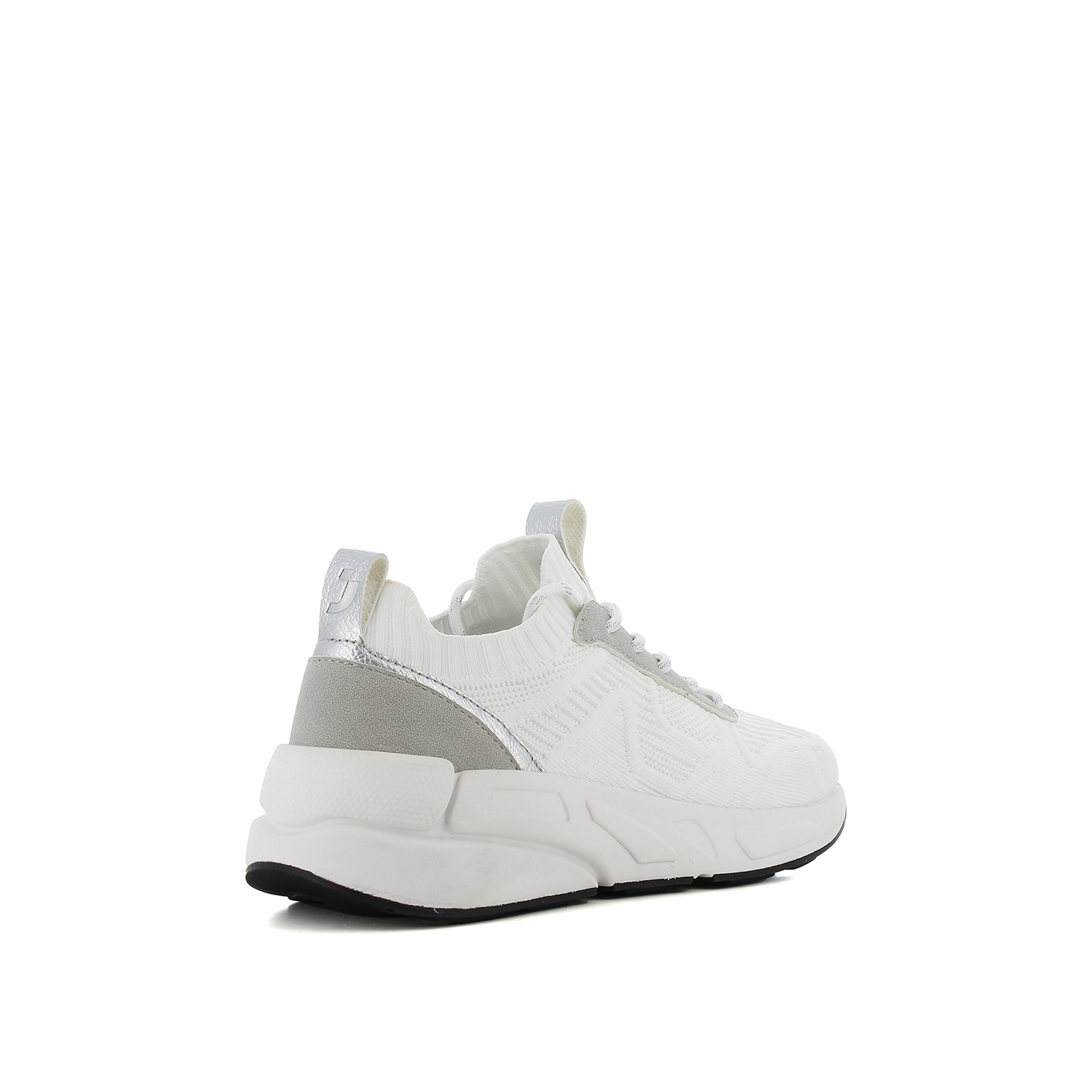 Λευκό γυναικείο sneaker φωτογραφία