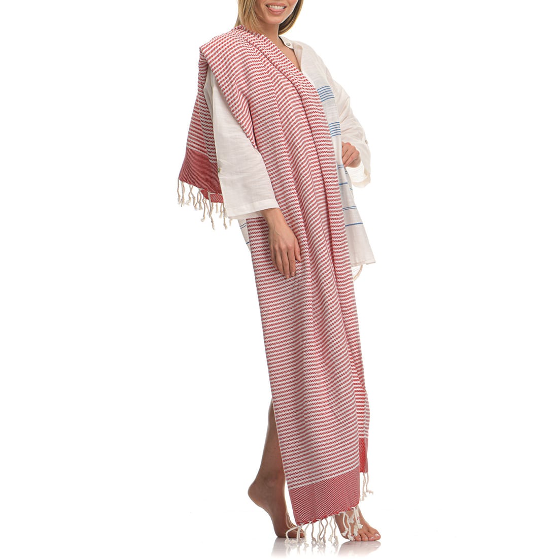 Άσπρη-κόκκινη ριγέ πετσέτα θαλάσσης φωτογραφία